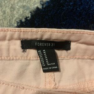 Medium Forever 21 light pink button up skirt